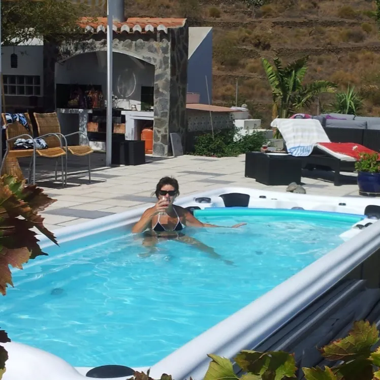 Sunrans Aprobado por CE Venta al por mayor de acrílico al aire libre Balboa Hydropool Aqua Sport Swim Spa Luxury Hot Tubs Piscina sin fin