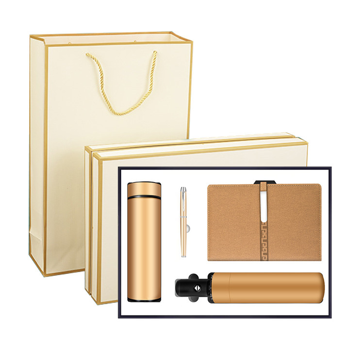 Or (4 pièces : cahier + stylo + thermos + parapluie)