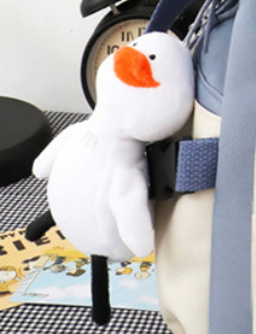 Pendentif noir + canard en plein vol