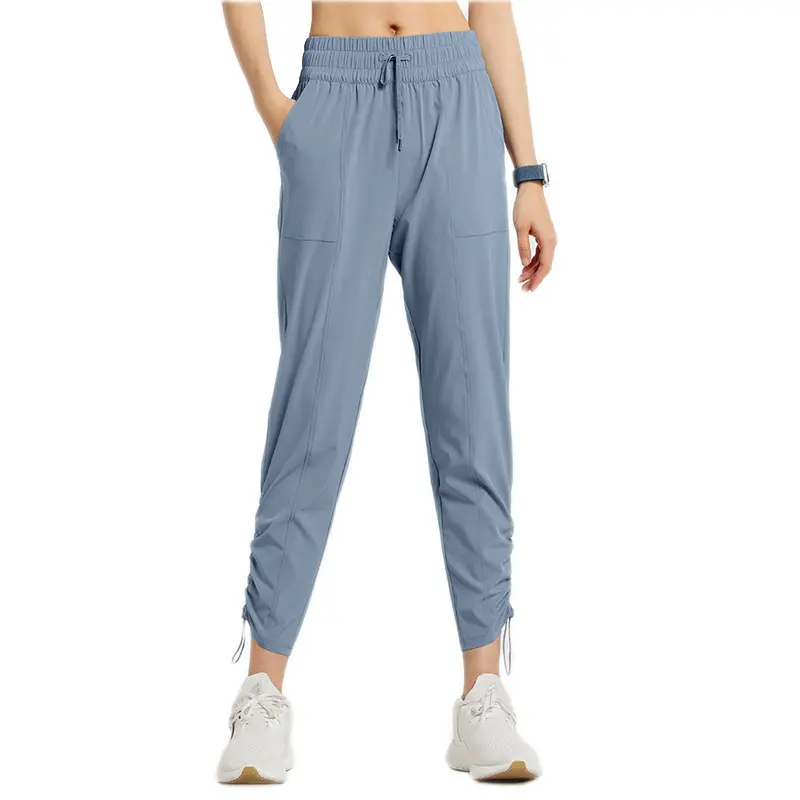 Venta al por mayor de alta calidad bolsillos laterales ajustable cordón cintura mujeres Lulu limón gimnasio Jogger baile estudio pantalones de Yoga