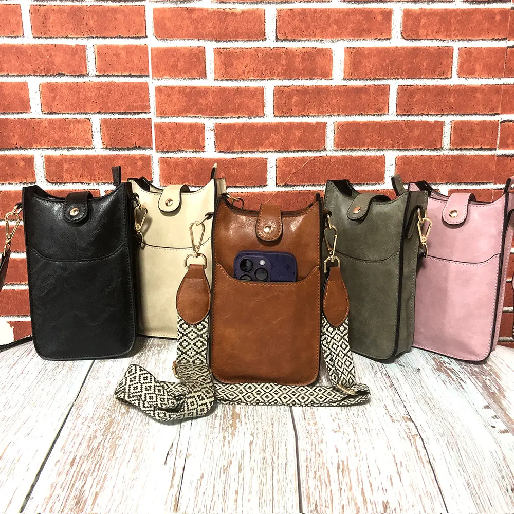 2024 à la mode Mini léger téléphone portable dames unique sacs à bandoulière couleur unie en cuir Pu sac à bandoulière sacs à main