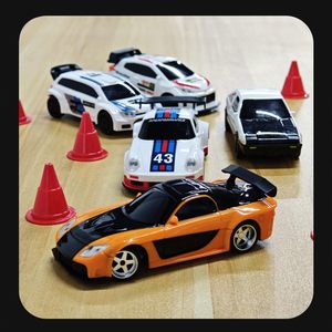 Dwi Dowellin <strong>1</strong>/43 Scale RC Drift Car 2.4G 4WD Full Proportional <strong>Control</strong> Mini Electric Racing Drift Car Lights Remote Controller