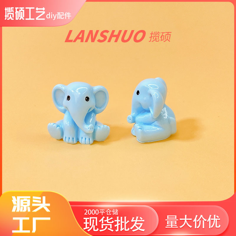 Light blue elephant figurine B-560-08