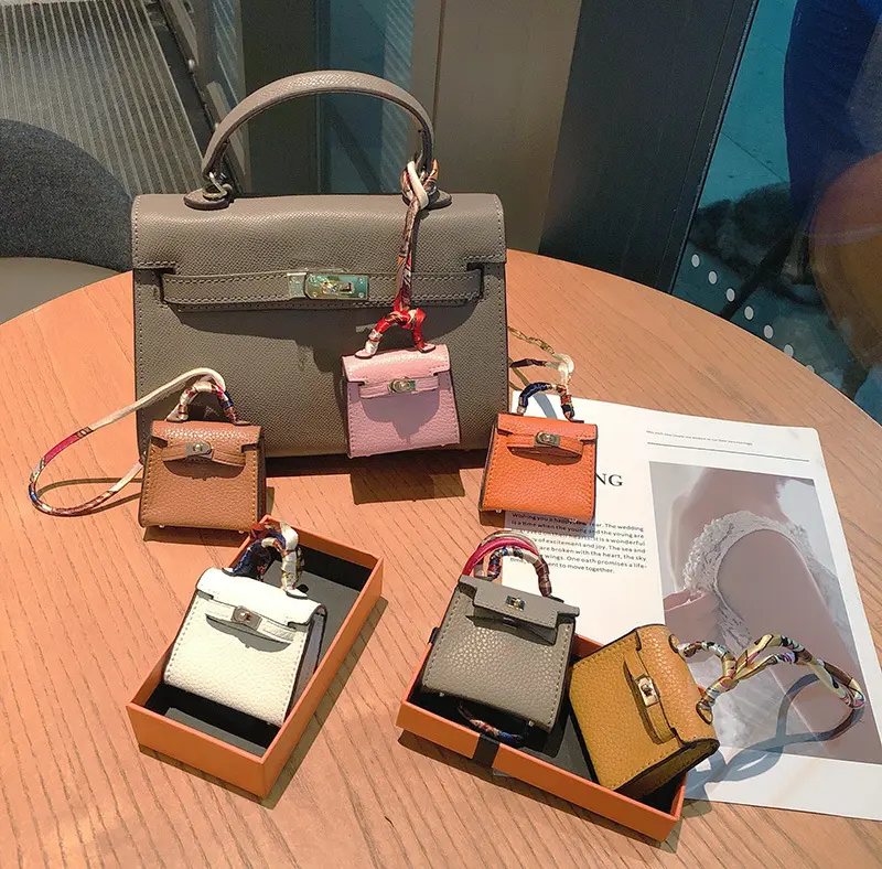 2023 nuevo diseño de gama alta niñas regalo Mini cartera llavero mujer cuero genuino monedero llavero auricular bolsa llaveros