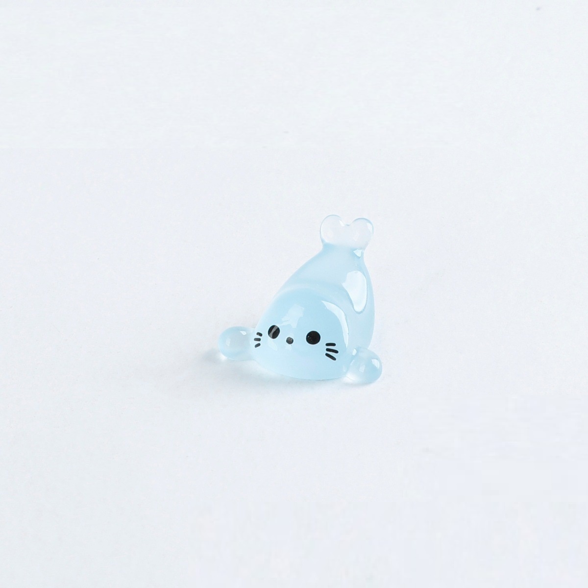 Lying on the seal ornament