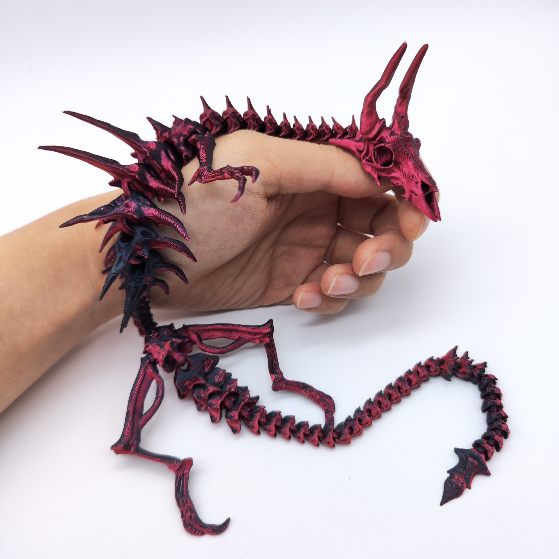 Dragon à os rouge foncé
