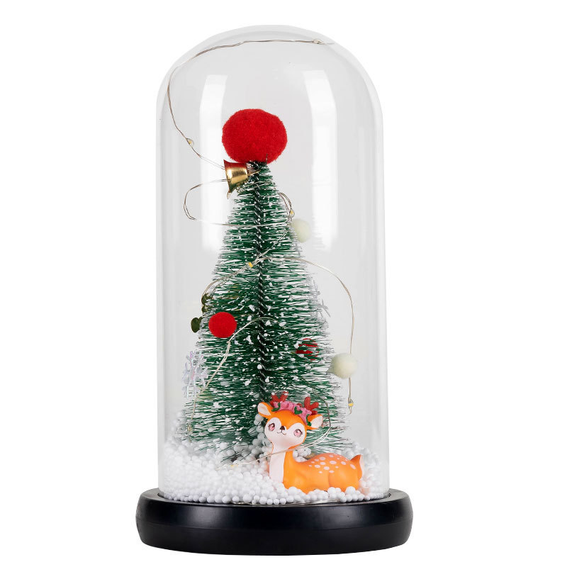 Glass-covered fluffy ball in a lying position - little deer