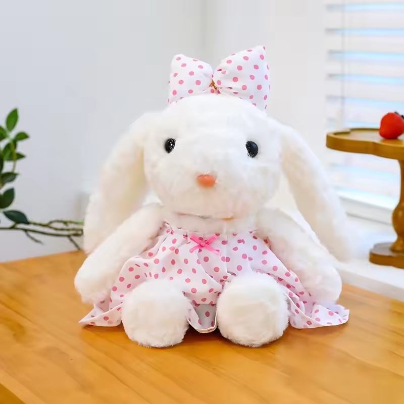 Falda blanca con nudo de mariposa y conejito de princesa, lunares rosas.