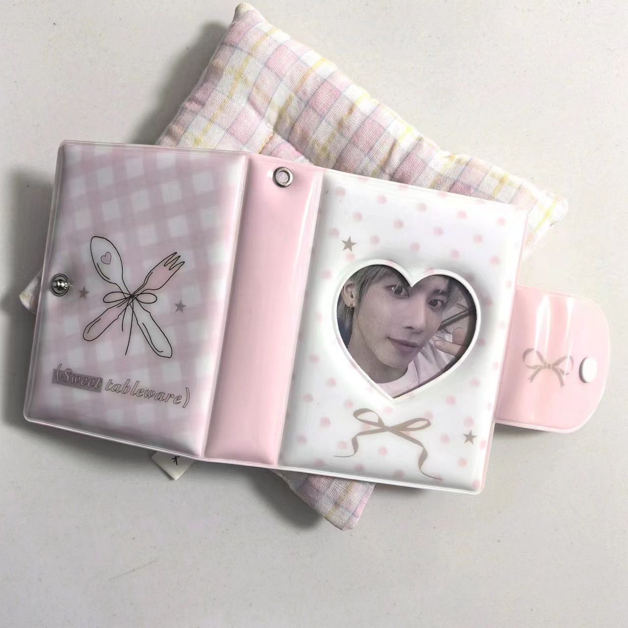 Álbum rosa del cuchillo del arco