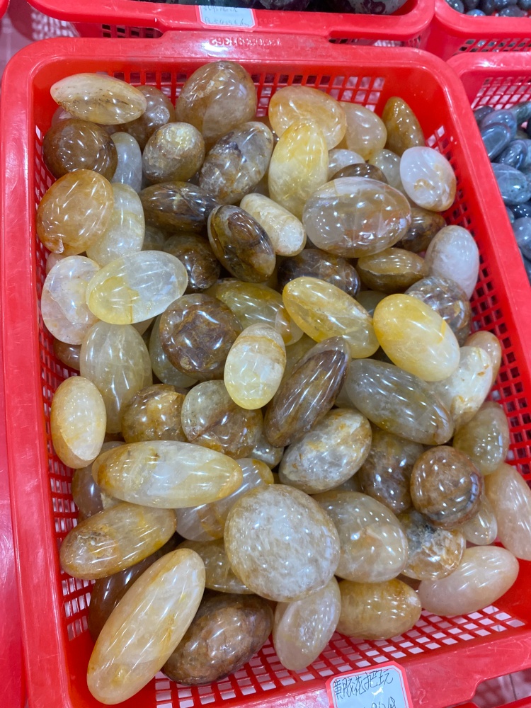 Pierre de paume en quartz doré pour la guérison