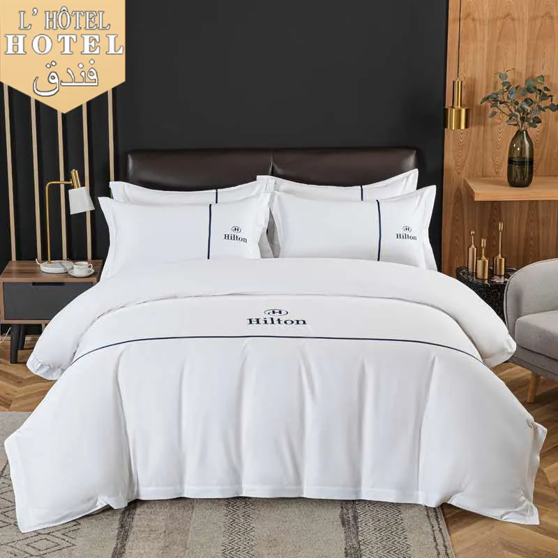 ชุดผ้าปูที่นอนผ้าฝ้าย5ดาว,ชุดเครื่องนอนโลโก้ที่กำหนดเองสีขาวโรงแรมฮิลตันผ้าปูเตียงยี่ห้อ
