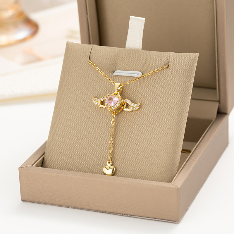 Golden love moving wings tassel necklace