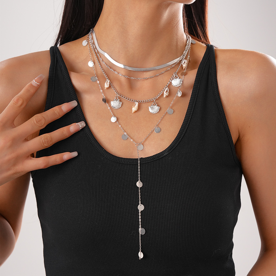 4 # collier-argent (quatre pièces)