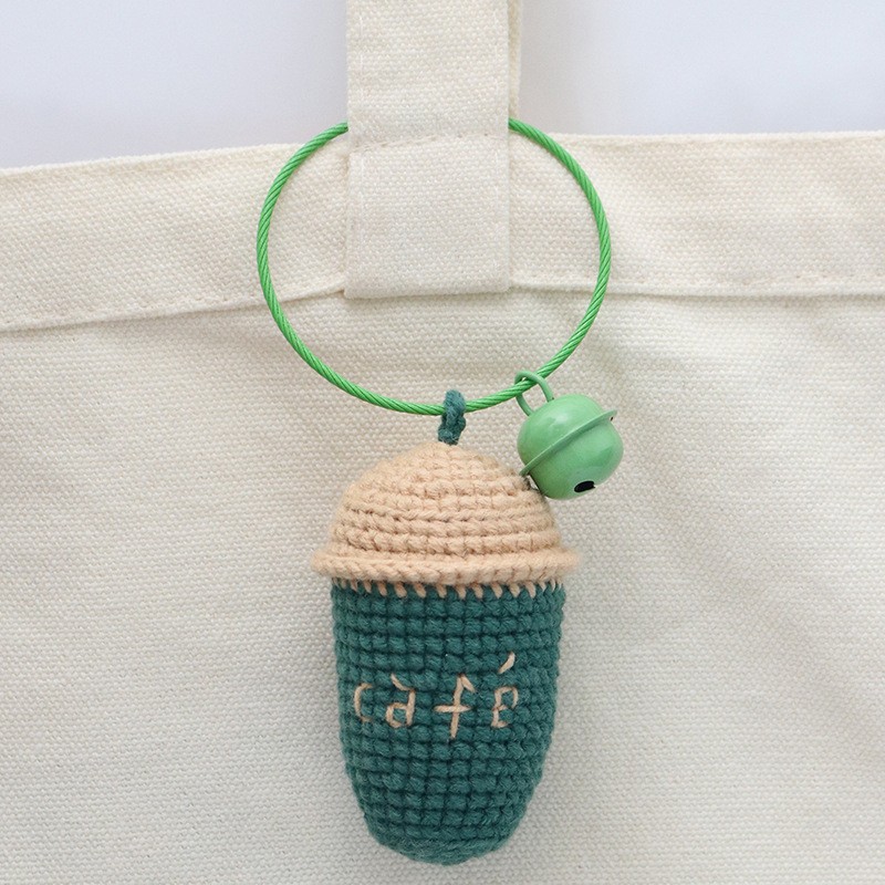 Boucle métallique pour tasse à café verte