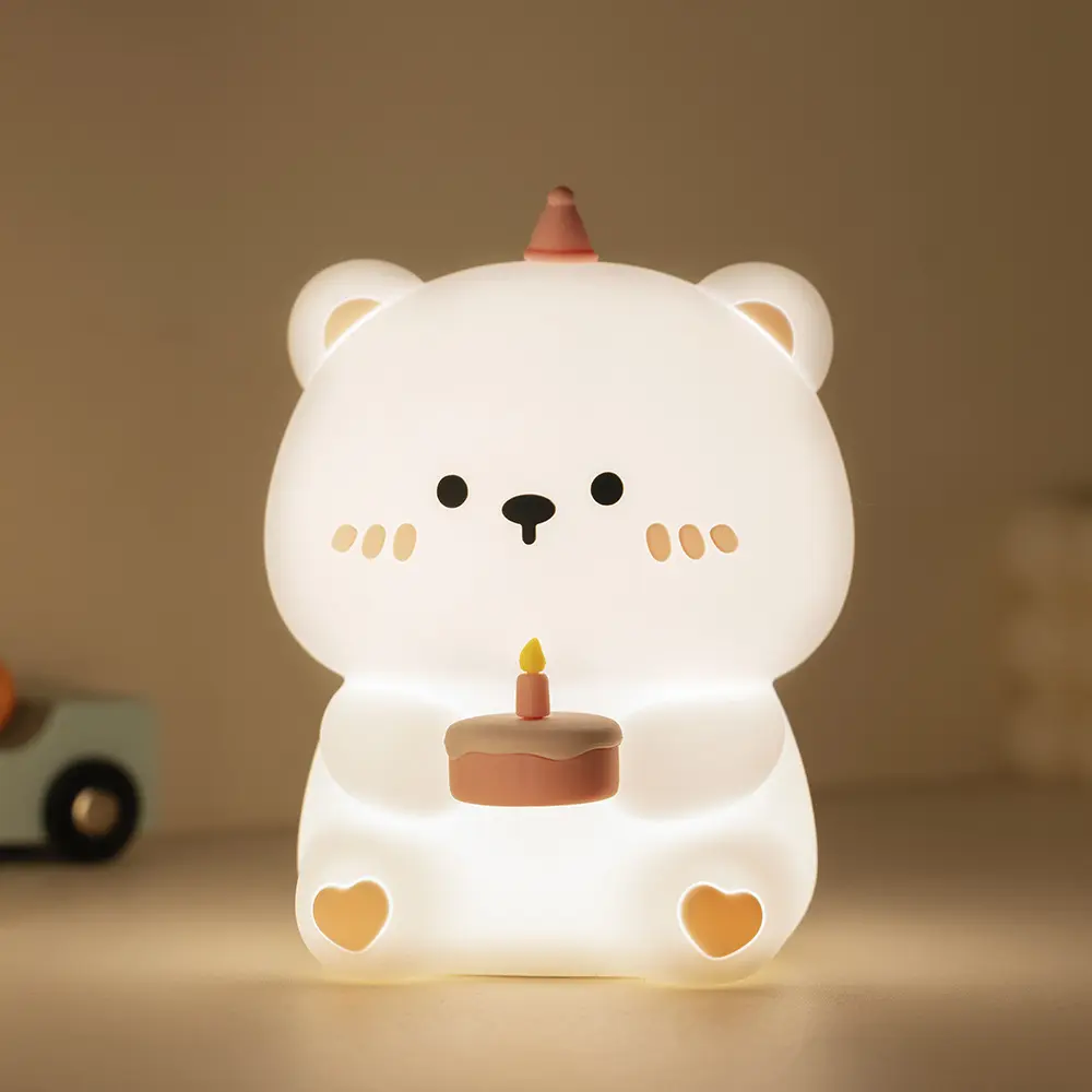 Nuevo pastel transfronterizo oso palmaditas luz USB recargable silicona venta al por mayor mesita de noche estudiante regalo lámpara de noche