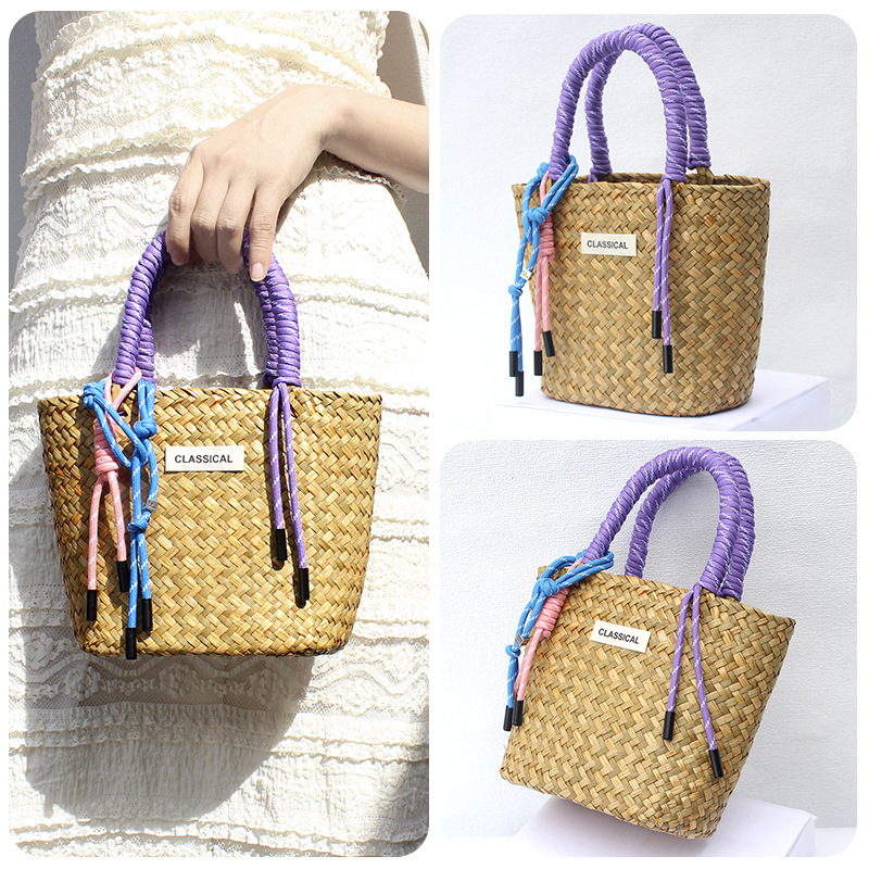Yellow bag with purple hand rope