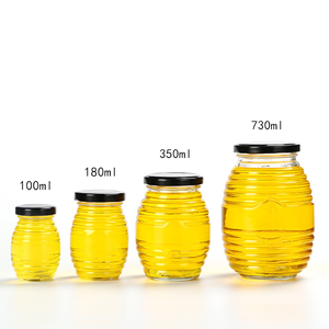 Ucuz 100ml 180ml 350ml 730ml arı kovanı petek şekli cam bal kavanozları - Product Image 1