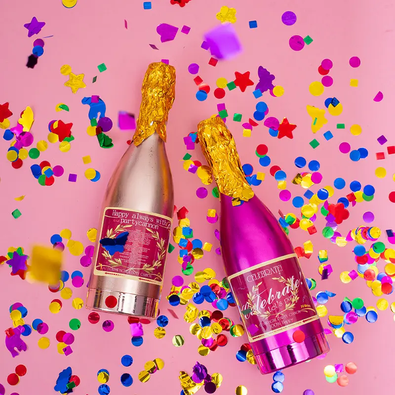 Bottiglia di Champagne festa Popper festa di compleanno coriandoli torniti a mano fuochi d'artificio atmosfera puntelli bar salute coriandoli cannone