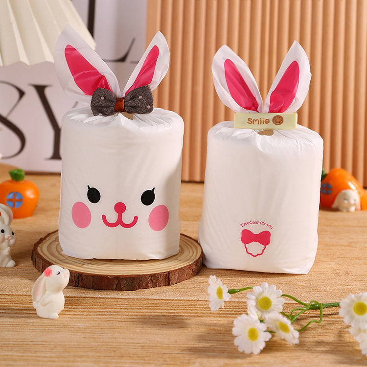 Petit lapin souriant rose