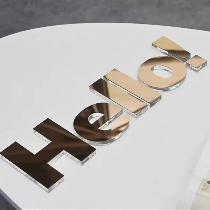 ป้ายตัวอักษรช่องสแตนเลสสตีลแบบกำหนดเองตัวอักษรโลหะสีทองสำหรับตกแต่งโลโก้ธุรกิจจดหมายติดผนัง