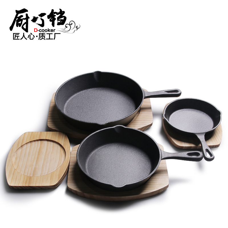 Dessous de plat en bois noir pour poêle à frire