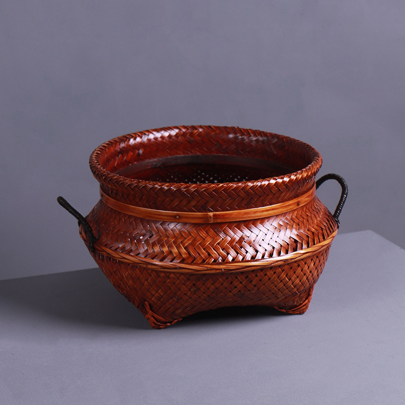Storage basket with handles, approximately 26*17.5 cm.