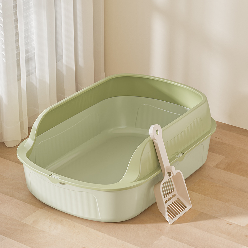Green cat litter scoop