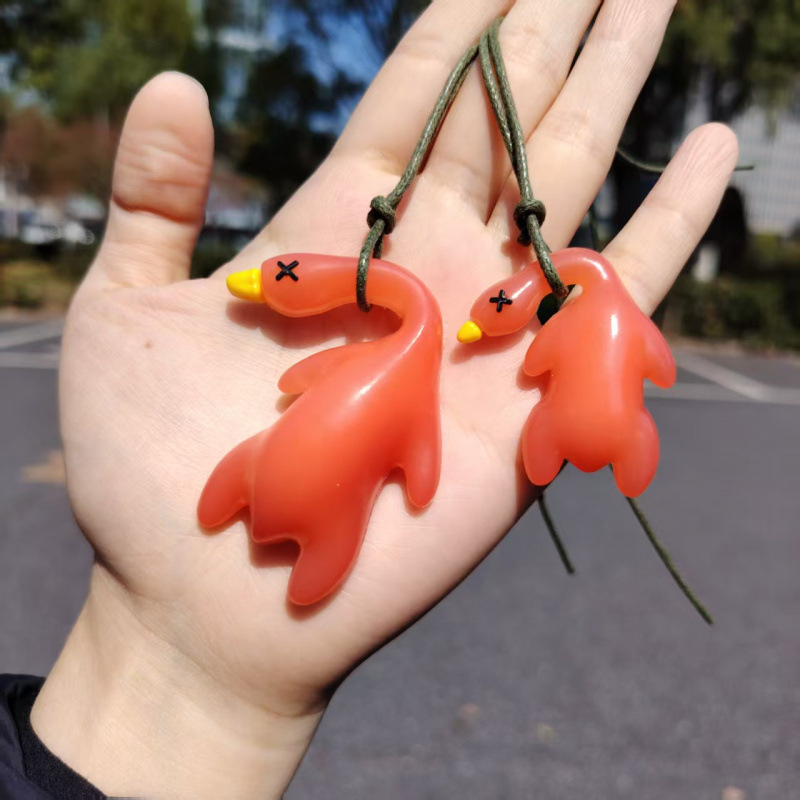 Pato asado grande de 5 cm que cambia de color (con cuerda)