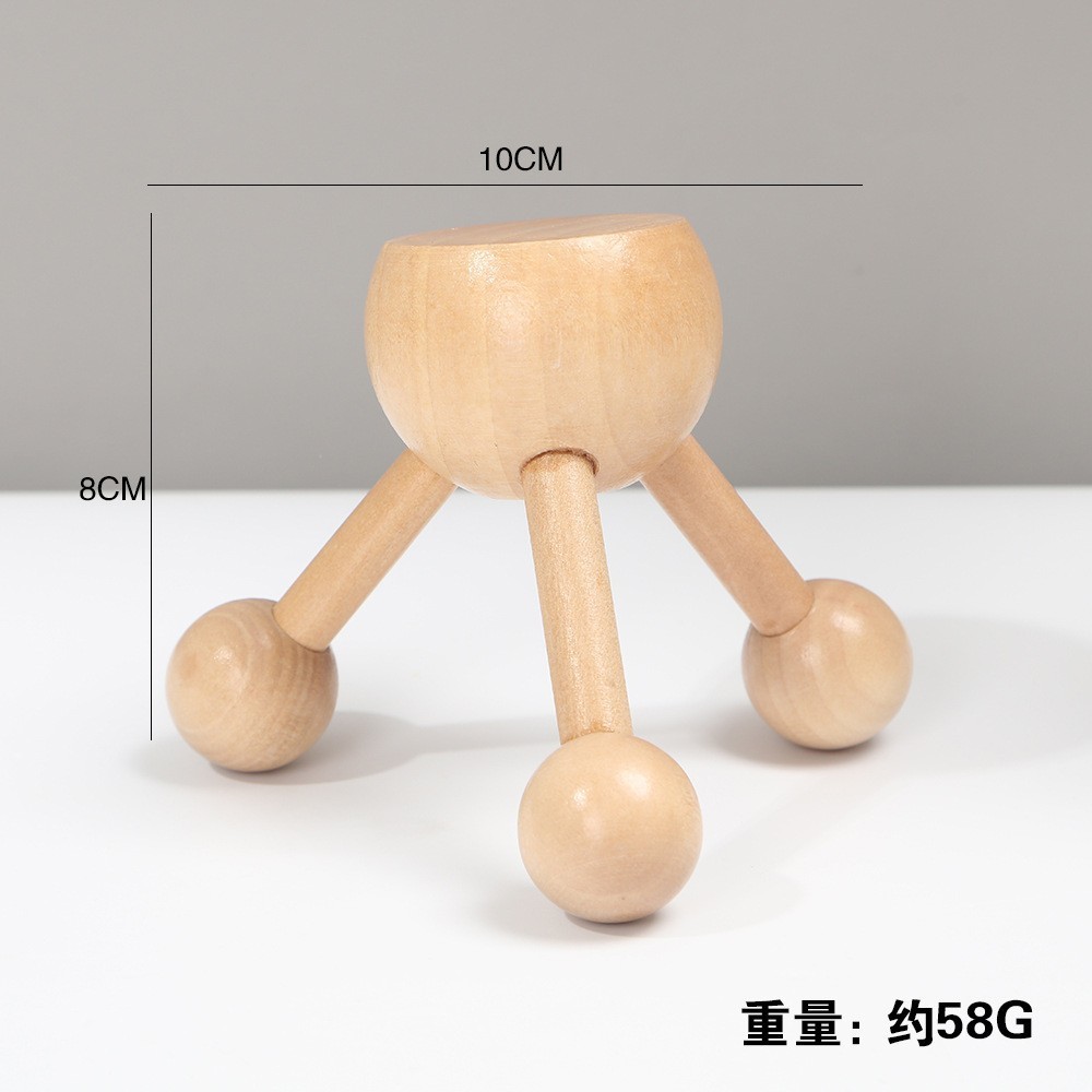Masajeador de cabeza de madera con tres patas.