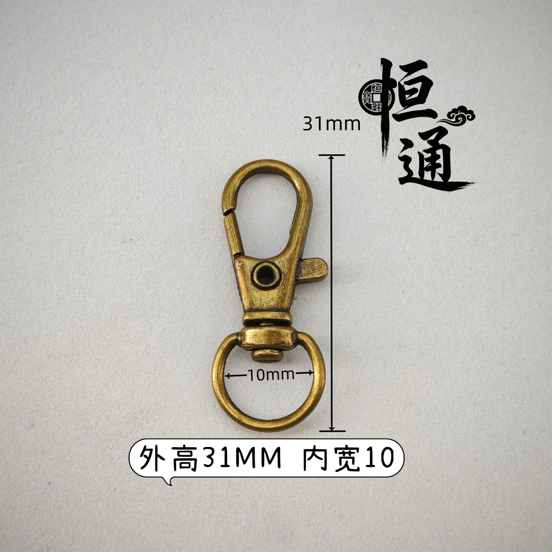 Couleur bronze, 2 points - diamètre intérieur 10 mm, hauteur 31 mm