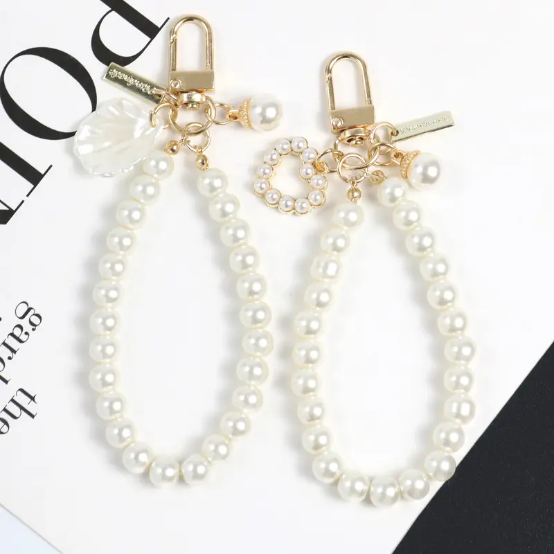 Perles perlées alliage porte-clés pour femmes nouveau sac de voiture minimaliste Bluetooth casque porte-clés pendentif bijoux en gros