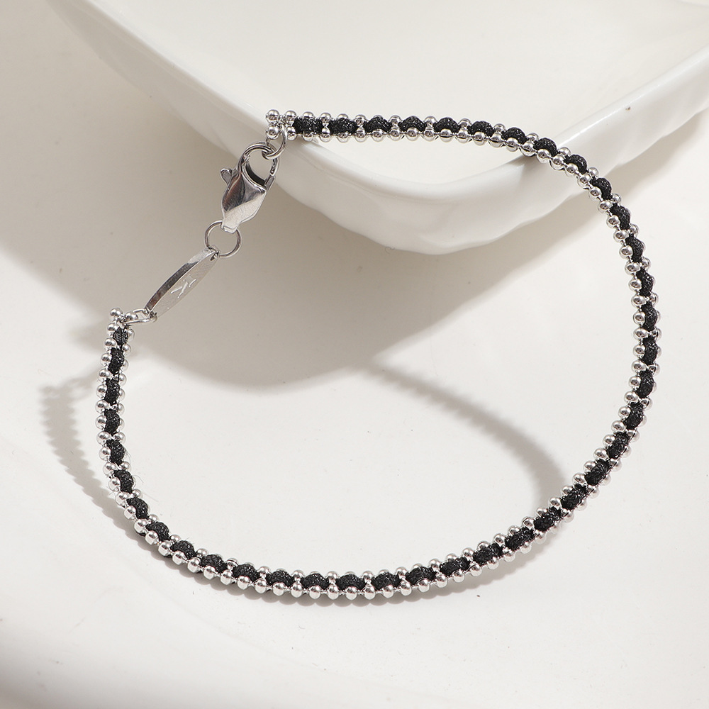 bracelet en corde tressée noire couleur acier