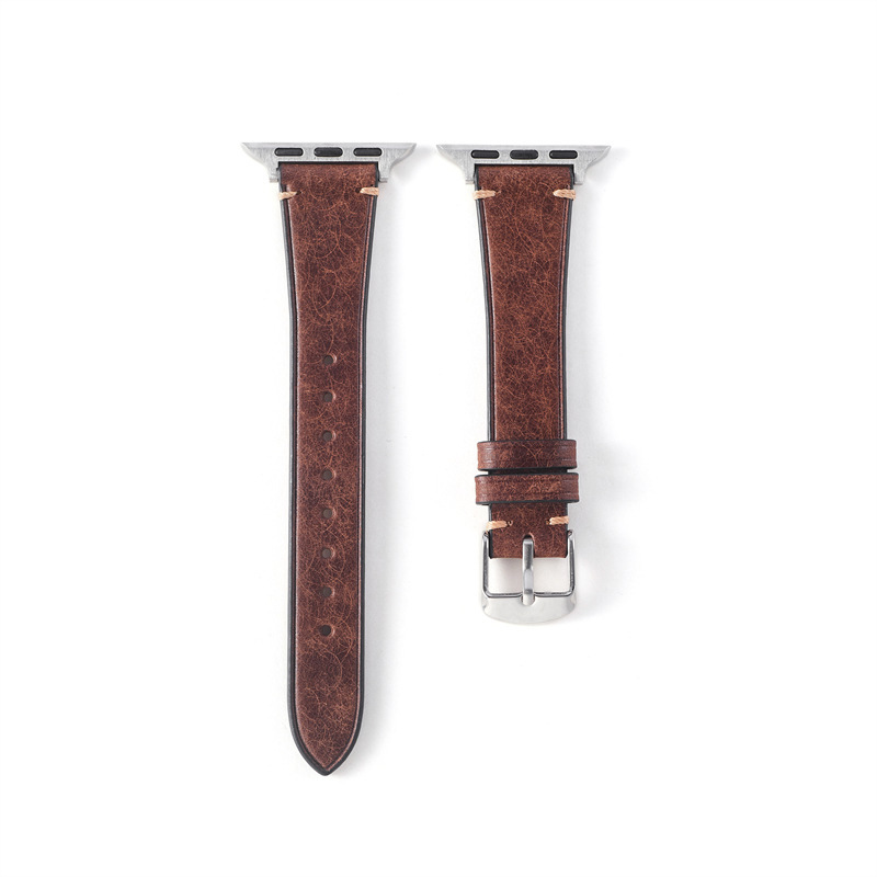 Boucle argentée pour bracelet de montre à café.