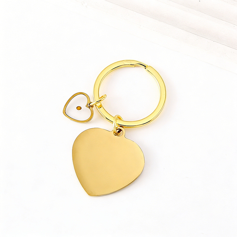 Llavero de colza en forma de corazón dorado