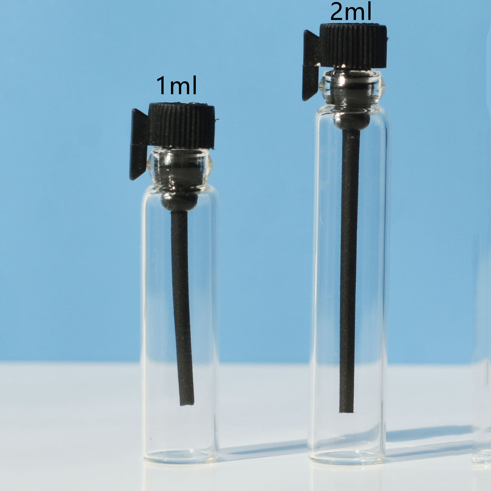 clear vial + black lid