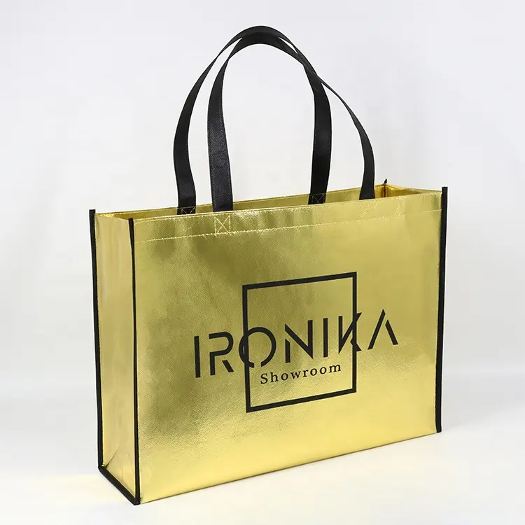 Borsa Tote in tessuto Non tessuto oro lucido di lusso per lo Shopping borsa a mano cosmetica con Logo personalizzato