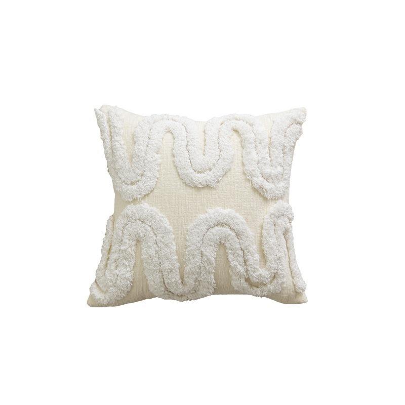 Fleur touffetée en forme de M