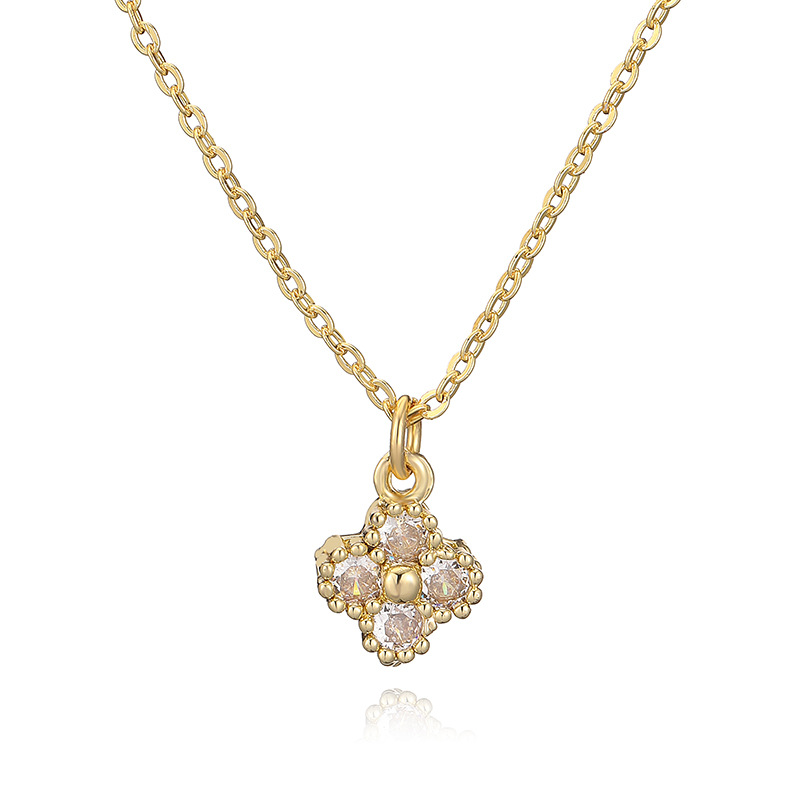 Collier trèfle à quatre feuilles en or blanc et diamants, modèle "O".