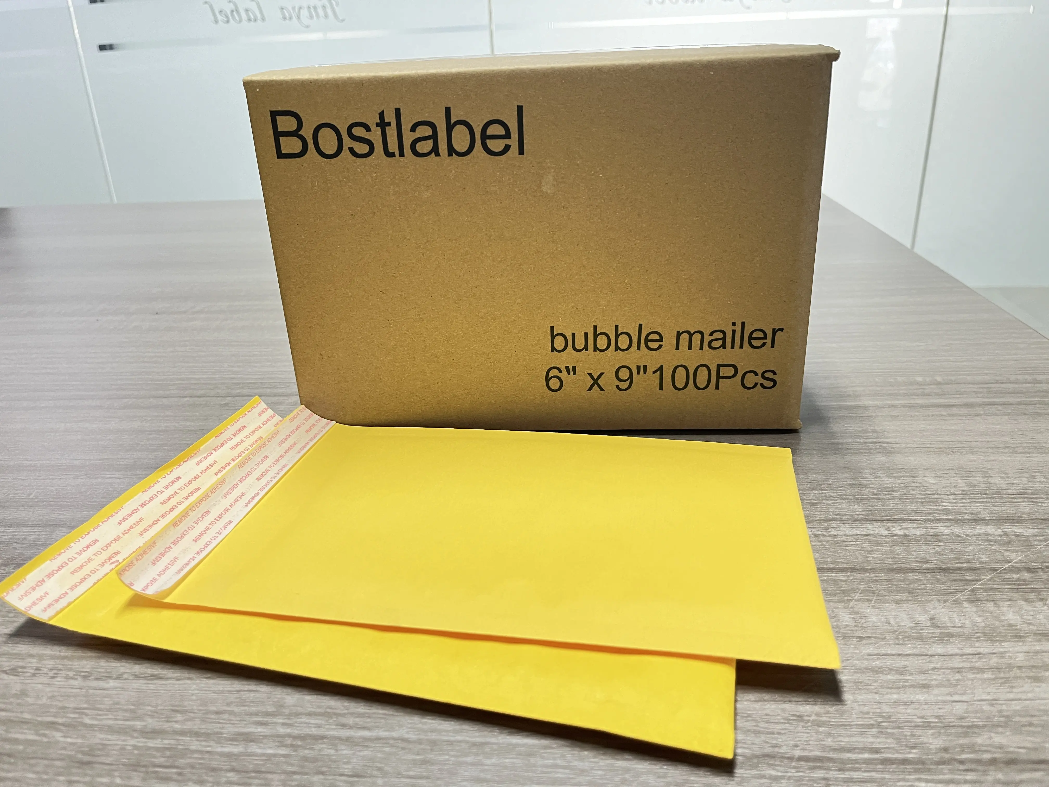 Bostlabel ที่กําหนดเองเป็นมิตรกับสิ่งแวดล้อมสีเหลืองกาวที่แข็งแกร่งถุงฟองอากาศบรรจุฉีกขาดหลักฐานฟองเบาะซองซองถุงช้อปปิ้ง