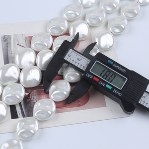 Zhuji Wholesale 18*19mm <strong>Shell</strong> of Baroque Pearl Natural White Stands for Sale