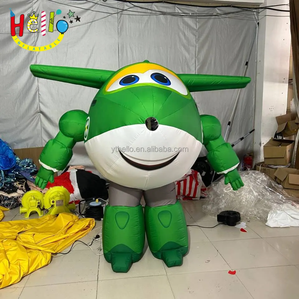 Disfraz de dibujos animados inflables de actuación de desfile, disfraz de jet inflable verde con globos grandes