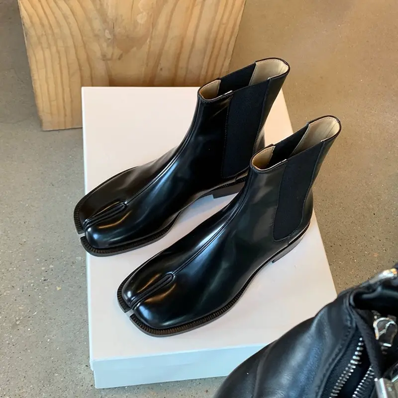 Venta al por mayor de zapatos de invierno personalizados para mujer tacón bajo cuero genuino Chelsea mujeres botas con punta dividida
