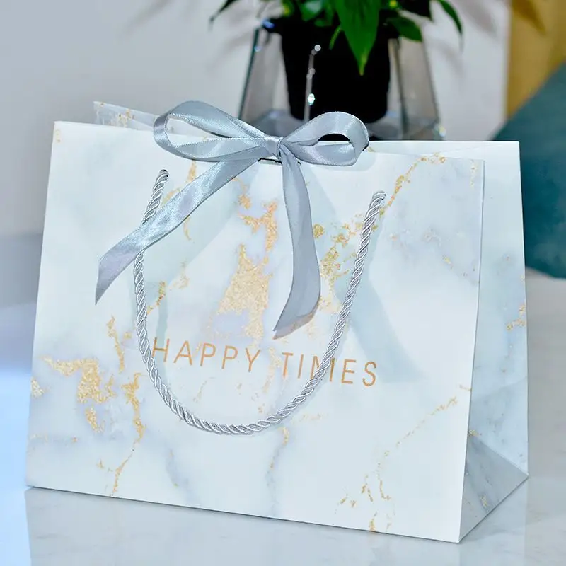 निर्माता कस्टम मरमर शॉपिंग उपहार बैग शादी पैकेजिंग कागज उपहार बैग के साथ संभाल