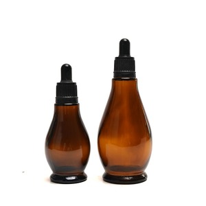 ขวดแก้วใส่น้ำมันหอมระเหยทรงหยดน้ำสีเหลืองอำพันขนาด10มล. 20มล. 30มล. 50มล. 100มล. - Product Image 1