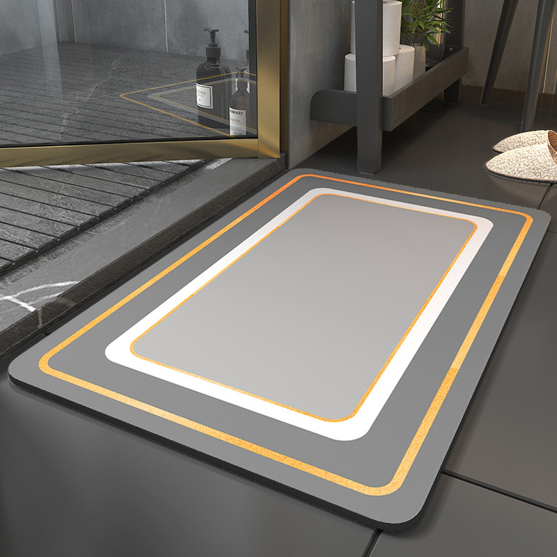 Tapis de bain en terre de diatomée - gris clair, entre carré et rond.