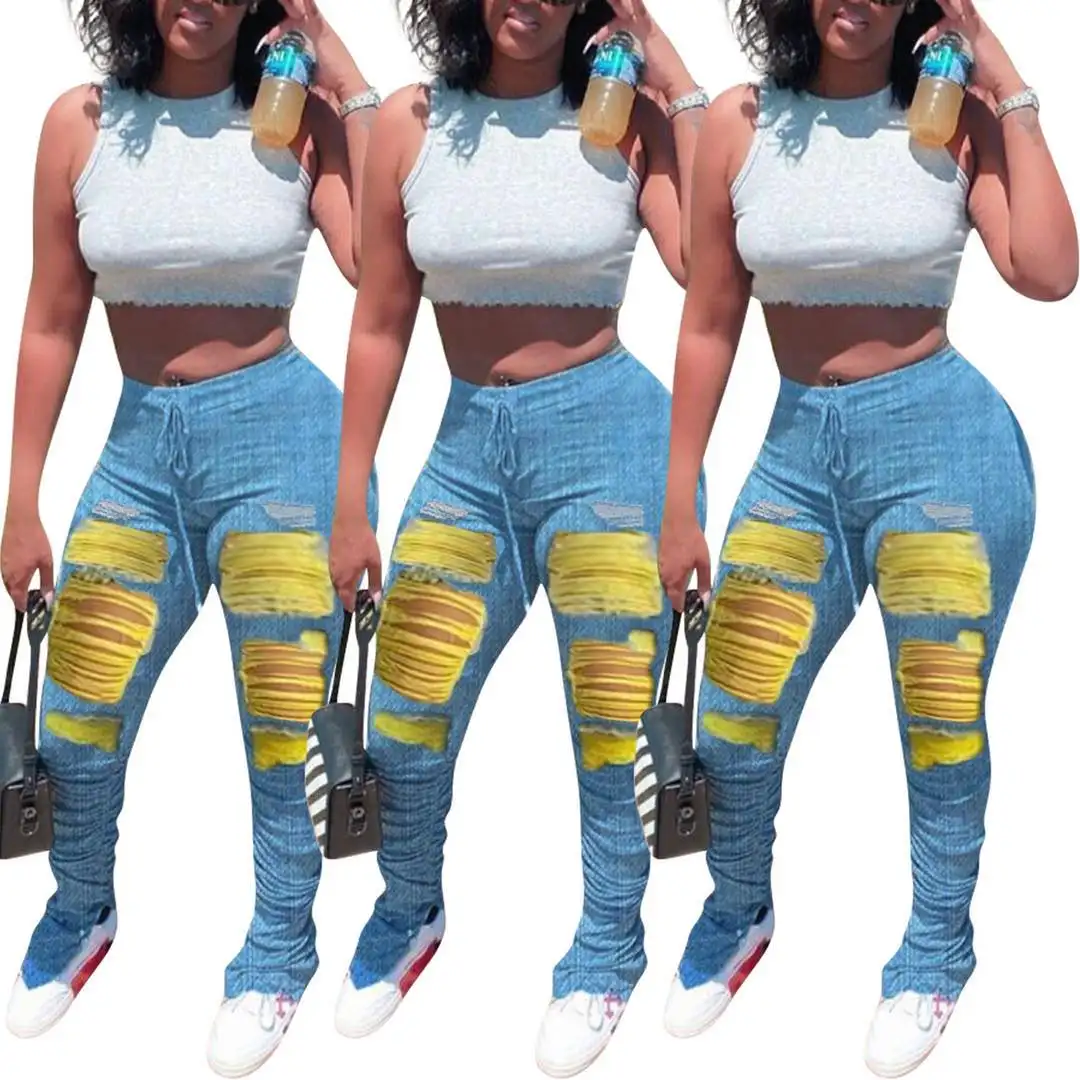 W e UN 2020 di estate modo caldo di vendita elastico in vita impilati dei jeans delle donne strappato increspato di colore del foro del denim legging