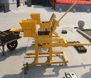 Máquina de fabricación de bloques de arcilla de la india, mini máquina manual de QTS2-40 para hacer ladrillos - Product Image 5