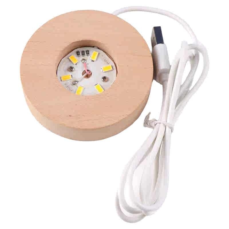 Base redonda de madera con luz.