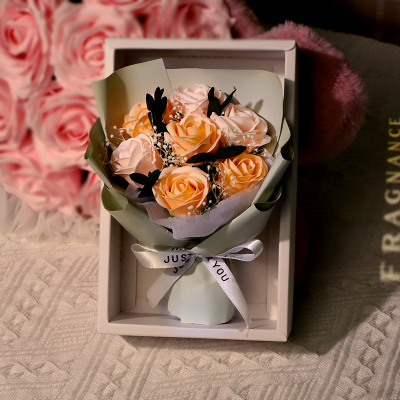 seven light orange champagne roses