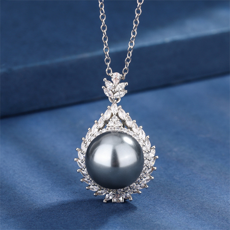 Gray bead pendant with cross chain